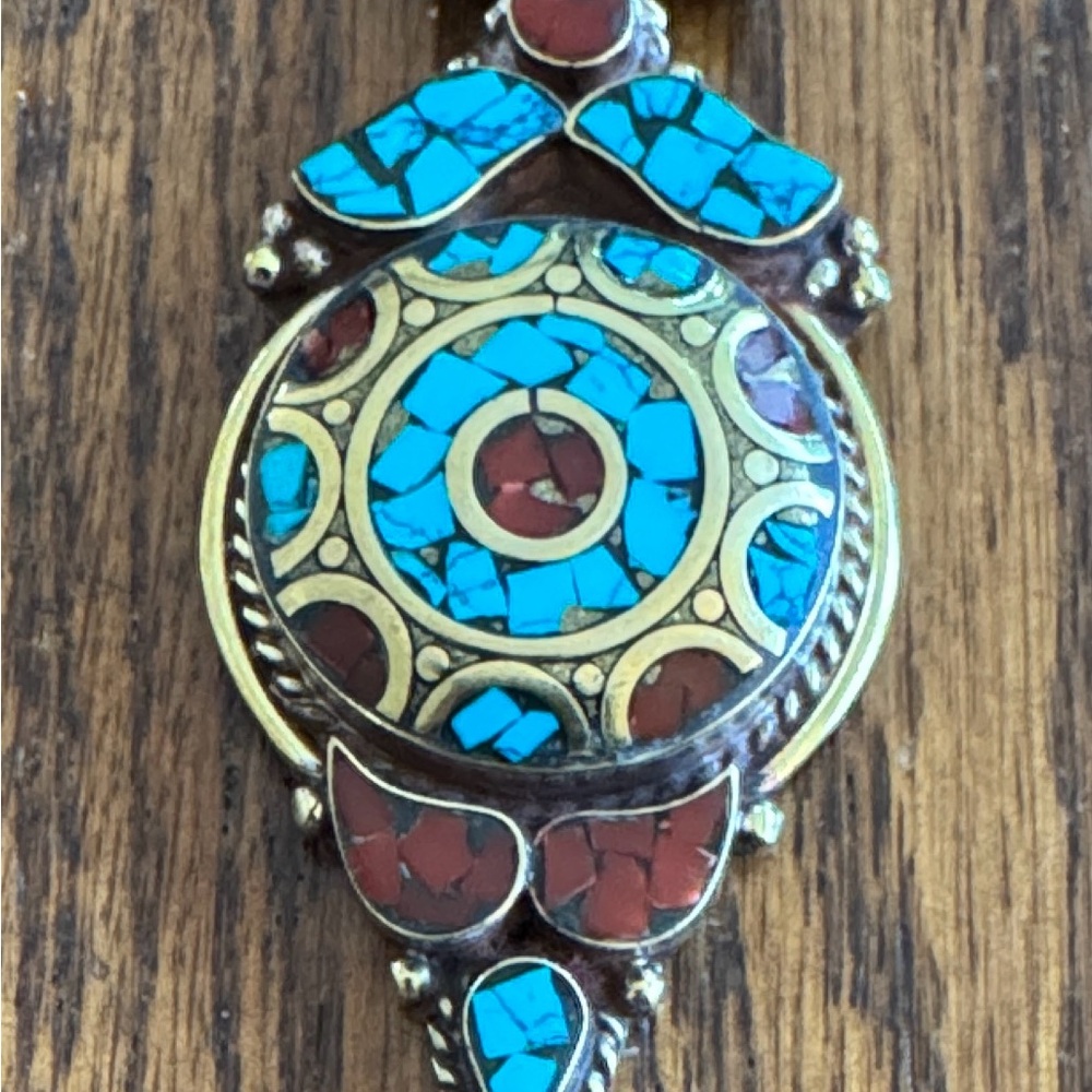 Turquoise and gold pendant